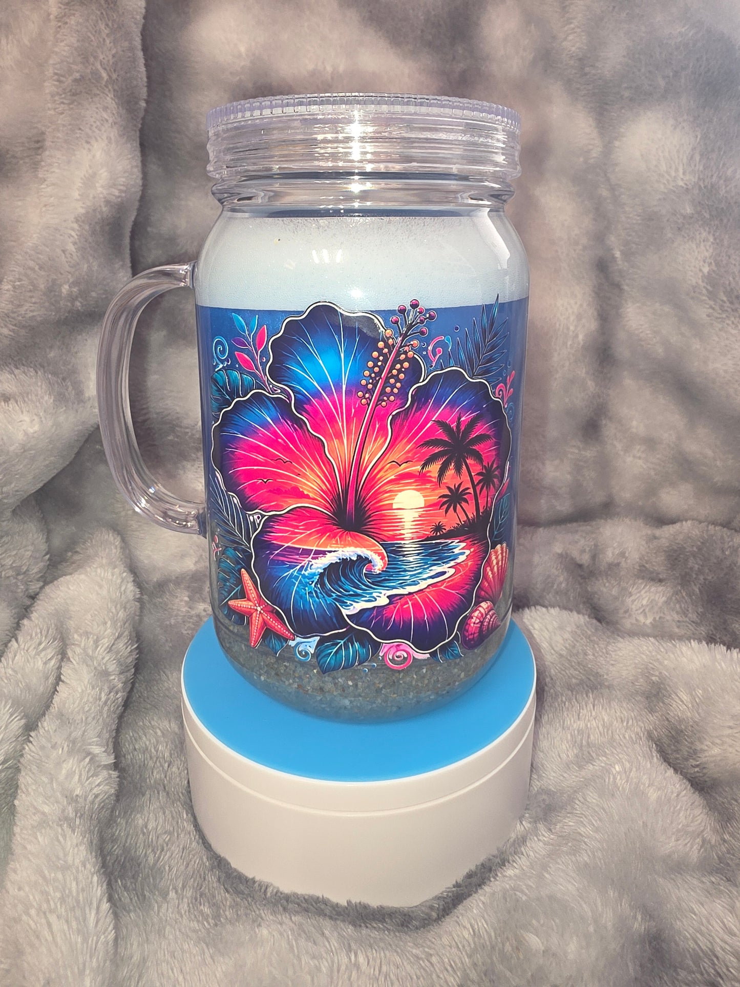 Beach tumbler with sand and foam